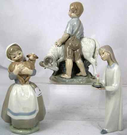 Appraisal: Nao Figures Boy with Goat Girl with Goat and Girl