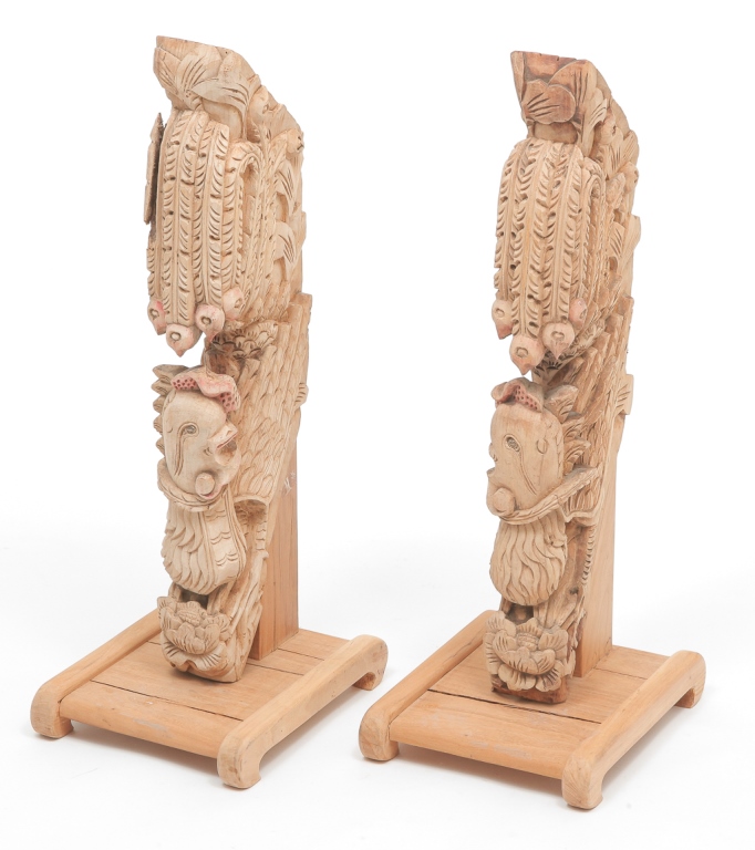 Appraisal: PAIR OF ASIAN PHOENIX CARVINGS Early th century camphor wood