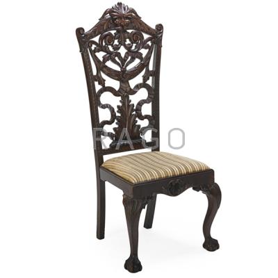 Appraisal: CHIPPENDALE STYLE SIDE CHAIR Heavily carved mahogany frame upholstered seat