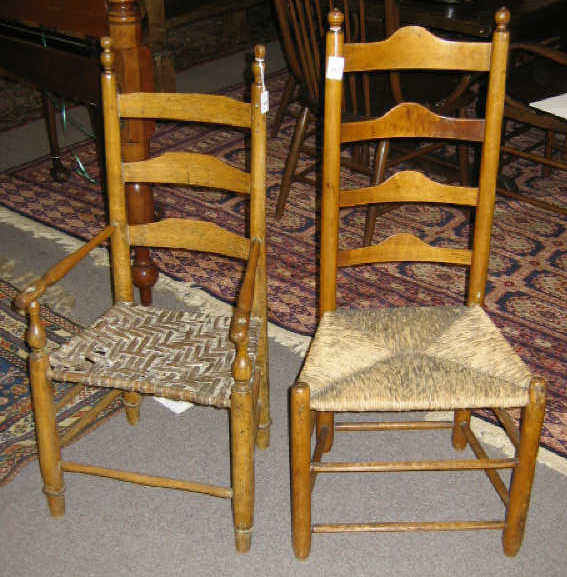 Appraisal: TWO AMERICAN LADDER BACK CHAIRS A late th century armchair