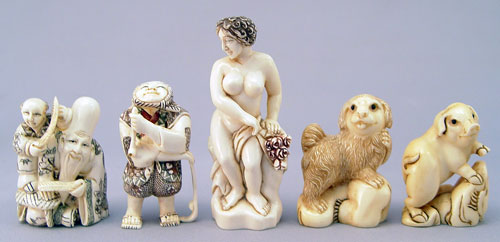 Appraisal: LOT OF MAMMOTH IVORY NETSUKE To include Pig on rock