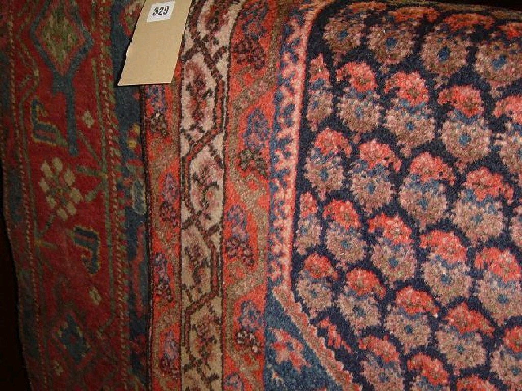 Appraisal: Two Eastern wool rugs with decoration in blue red green