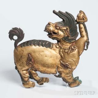 Appraisal: Gilt-copper Alloy Repousse Buddhist Lion Gilt-copper Alloy Repousse Buddhist Lion