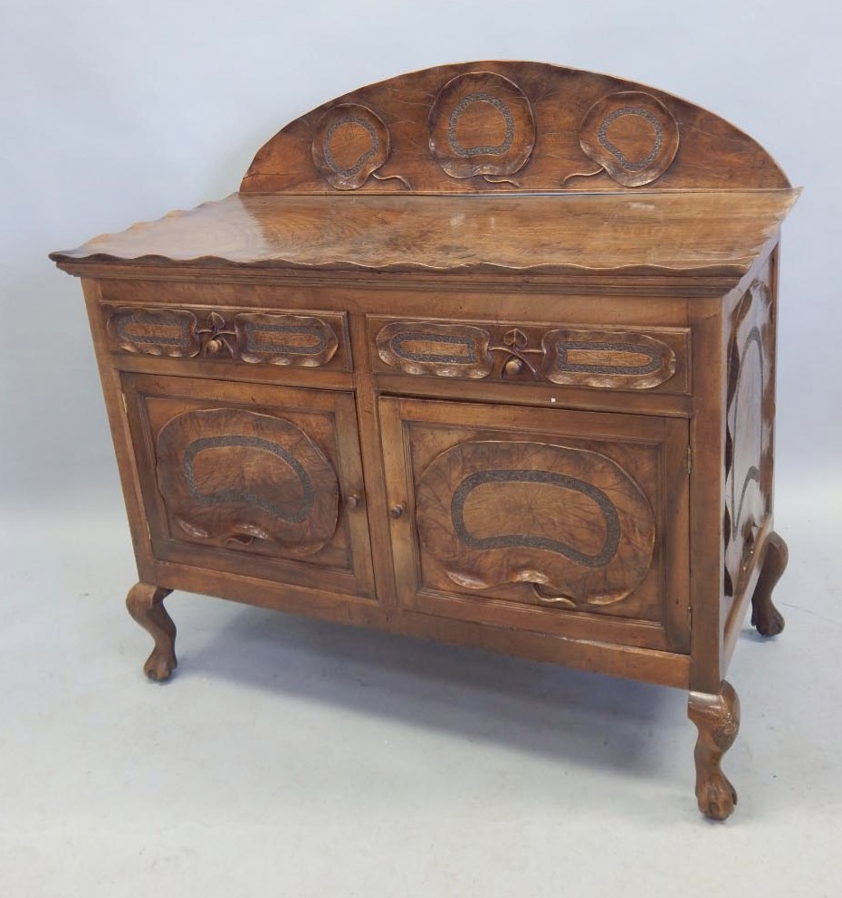 Appraisal: An unusual late thC early thC Oriental style sideboard carved