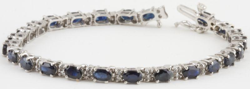 Appraisal: Sapphire and Diamond Bracelet set with oval cut blue sapphires