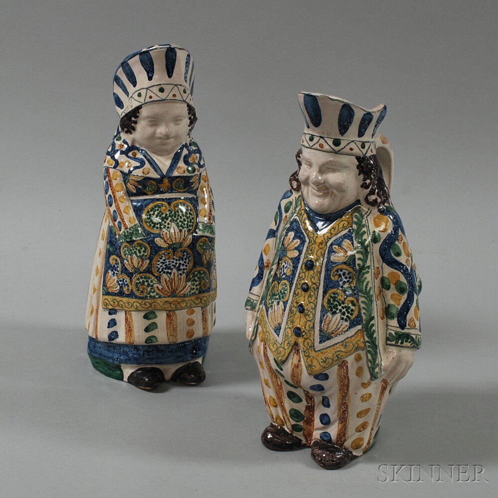 Appraisal: Pair of Tin-glazed Polychrome Figural Pottery Pitchers of a man