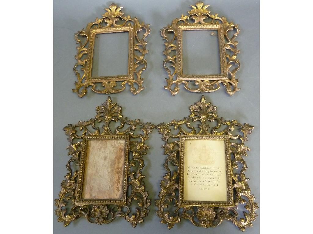 Appraisal: TWO PAIRS OF NINETEENTH CENTURY STYLE PIERCED GILT METAL PHOTOGRAPH