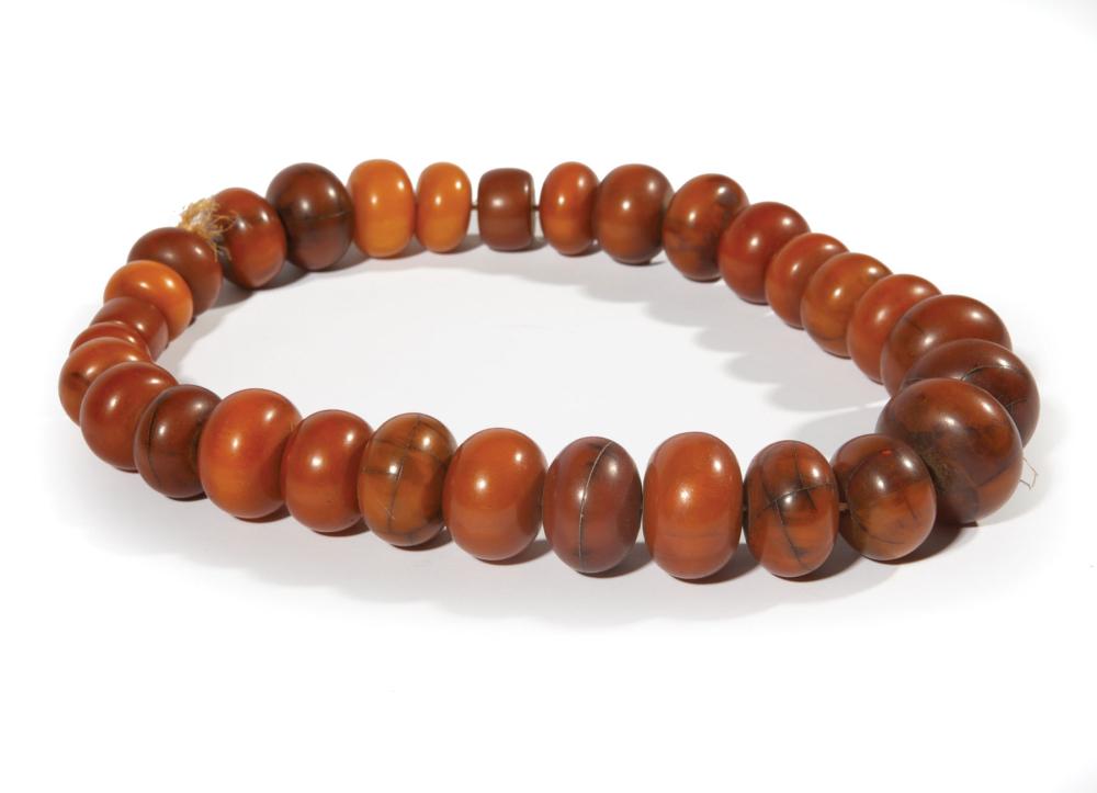 Appraisal: Thirty African Phenolic Resin Faux-Amber Trade Beads sometimes called African