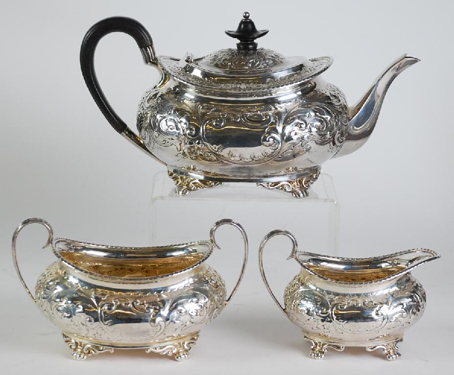 Appraisal: EDWARD VII SILVER THREE PIECE TEA SERVICE retailed by Z