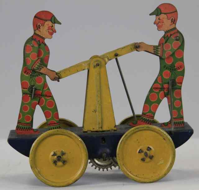 Appraisal: STRAUSS MEN ON HAND CART Lithographed tin features two die