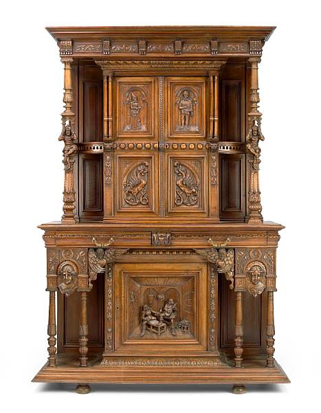 Appraisal: An imposing Continental Renaissance Revival carved walnut cupboard late th