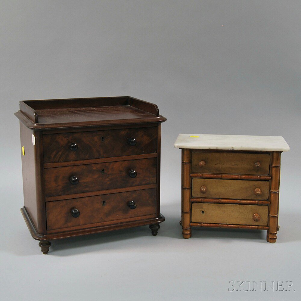 Appraisal: Two Miniature Chests th century a British mahogany three-drawer chest