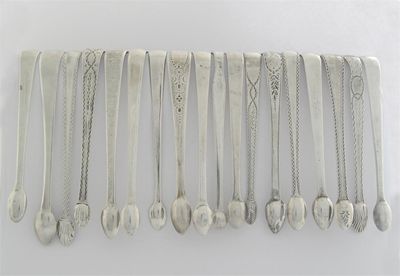 Appraisal: Eighteen various pairs of George III sugar tongs mixed designs