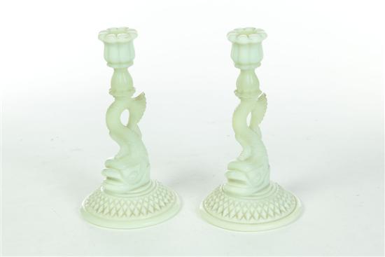 Appraisal: PAIR OF DOLPHIN CANDLESTICKS American mid th century Opalescent custard