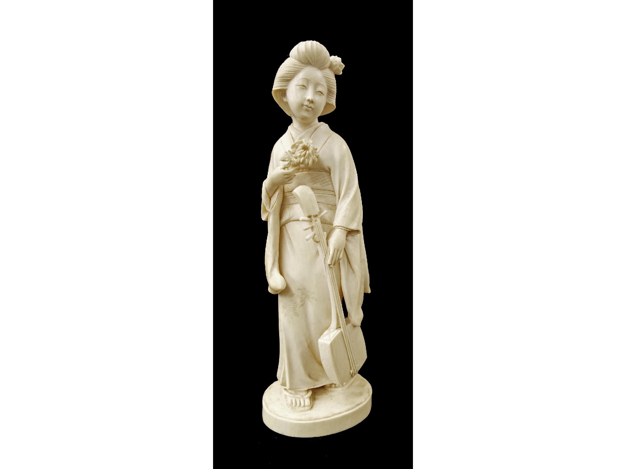 Appraisal: Japanese ivory okimono signed Ashihisa carved and modelled as a