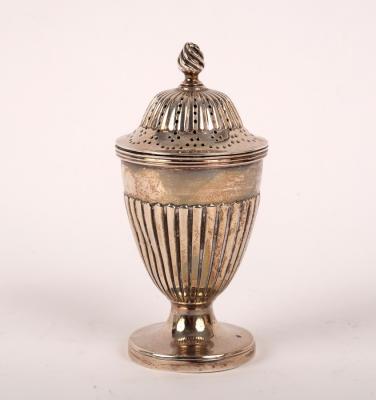 Appraisal: A George III urn-shaped silver pepper pot London cm high