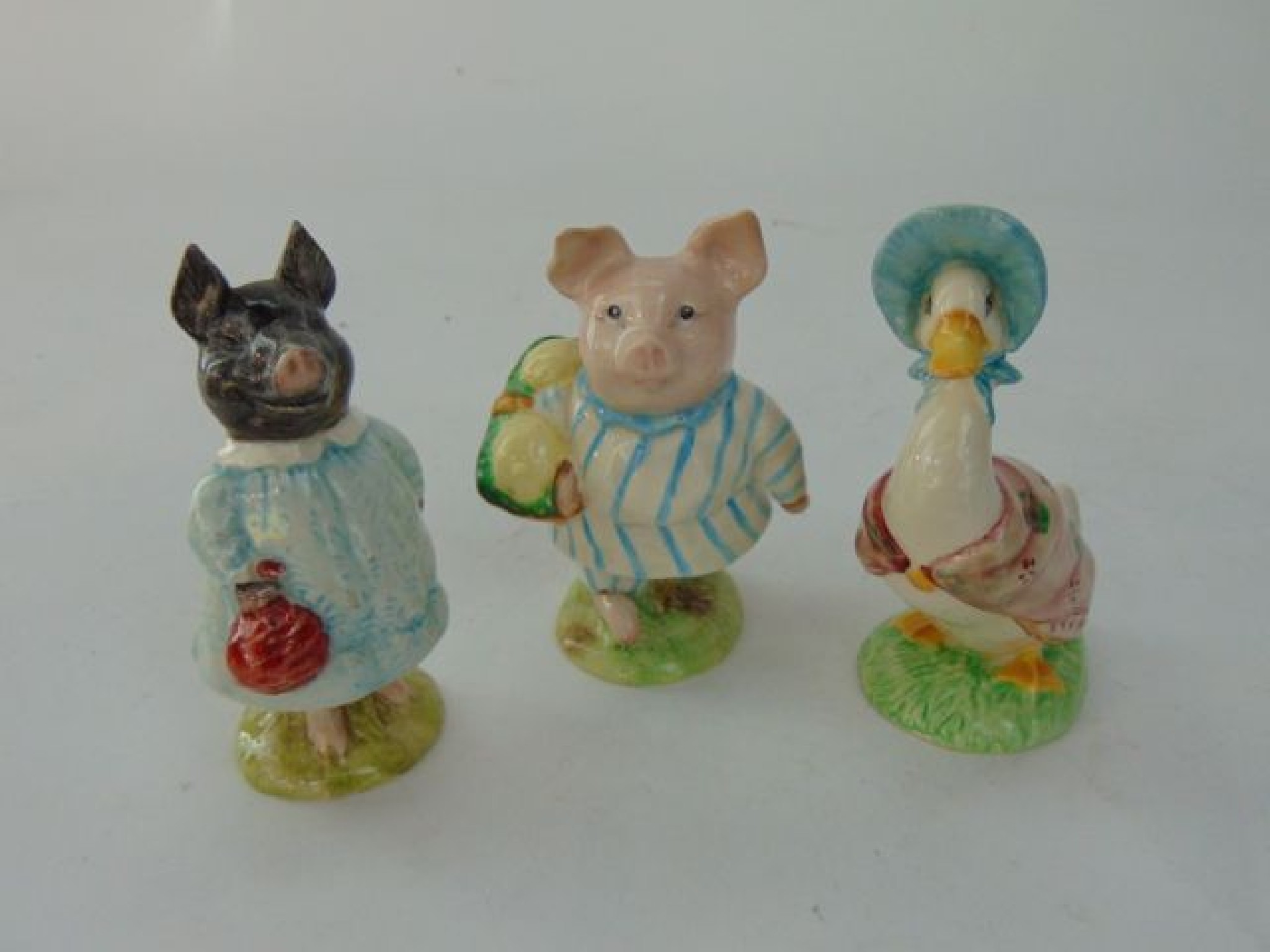 Appraisal: Three Beswick Beatrix Potter figures comprising Little Pig Robinson with