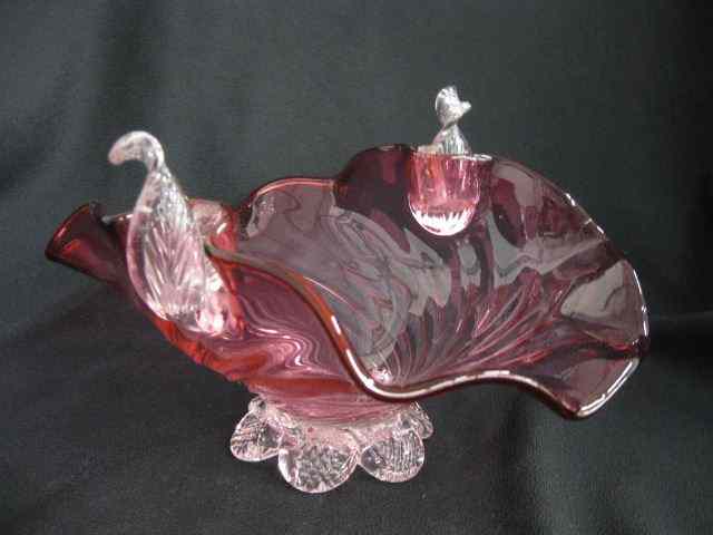 Appraisal: Cranberry Art Glass Bowl basket shape clear leaf handles swirling