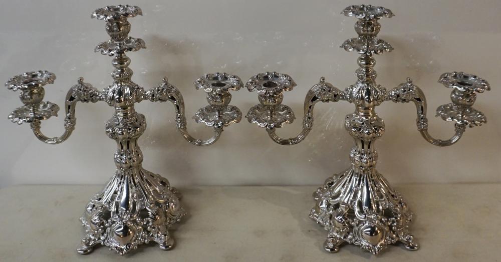 Appraisal: Pair Reed and Barton Rococo Style Pierced Silverplate Three-Light Candelabra