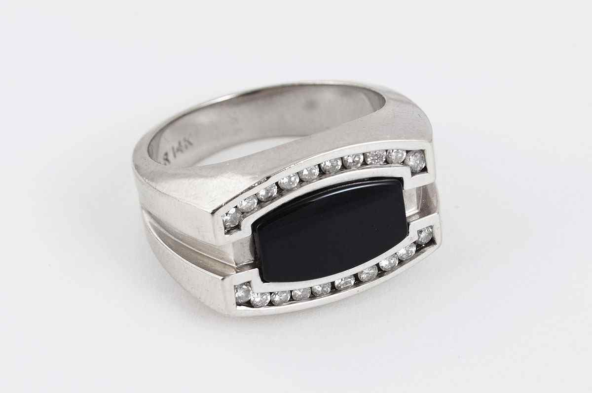 Appraisal: LADIES OR GENTS K ONYX DIAMOND RING K white gold