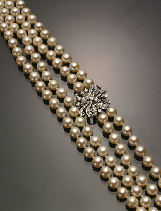 Appraisal: Matinee Length Cultured Pearl and Diamond Necklace Knotted The double