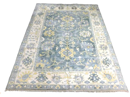 Appraisal: RUG Oushak carpet dove grey ground almond major border geometric