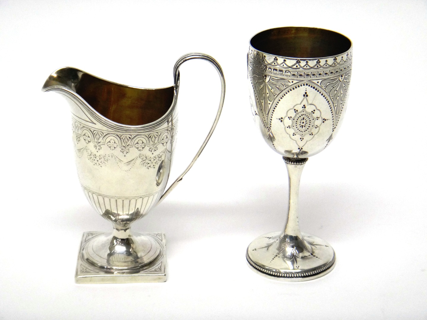 Appraisal: Silver comprising a George III milk jug with engraved decoration