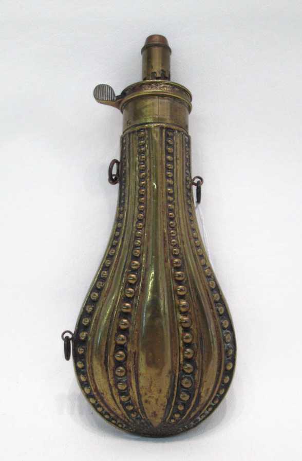 Appraisal: BRITISH NINETEENTH CENTURY POWDER FLASK brass body with bead design