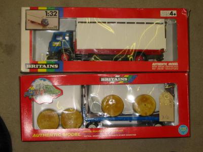 Appraisal: Britains Animal Transporter and Flat Bed Trailer boxed E