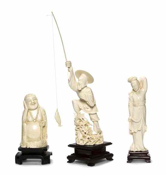 Appraisal: A Group of Three Ivory Carvings comprising a fisherman with