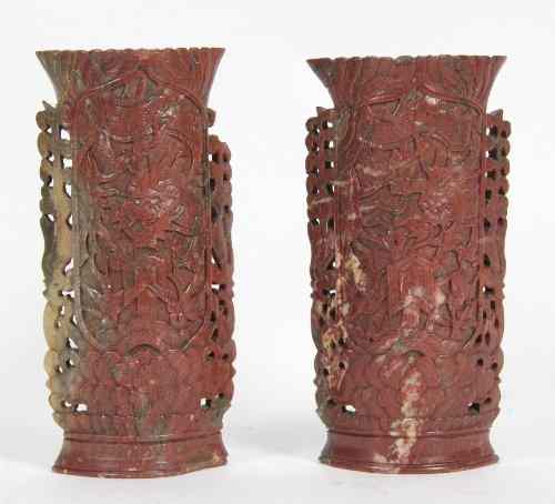 Appraisal: A pair of soapstone brush pots carved and pierced with