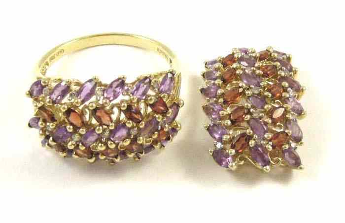 Appraisal: TWO ARTICLES OF AMETHYST AND GARNET JEWELRY including a ring