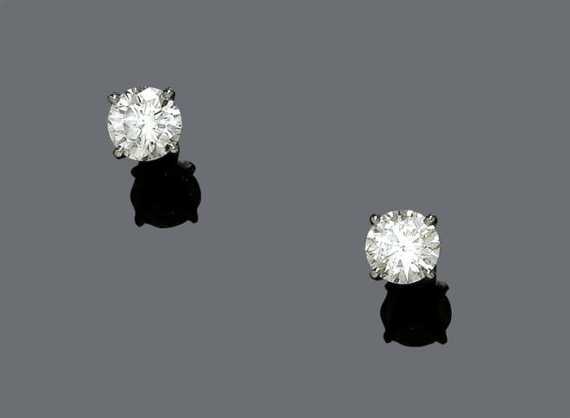 Appraisal: BRILLIANT-CUT DIAMOND EARRINGS White gold Elegant solitaire earrings each with