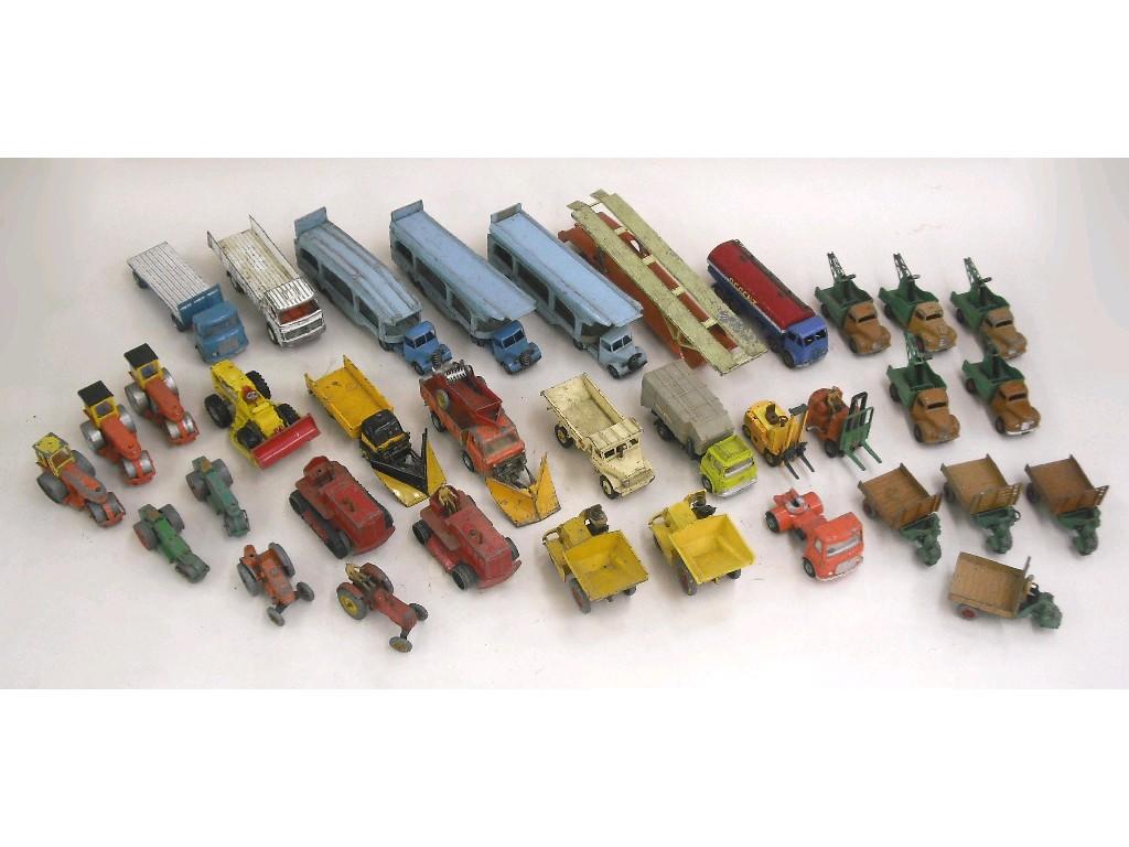 Appraisal: Three Dinky car transporters no Dinky service trucks and various