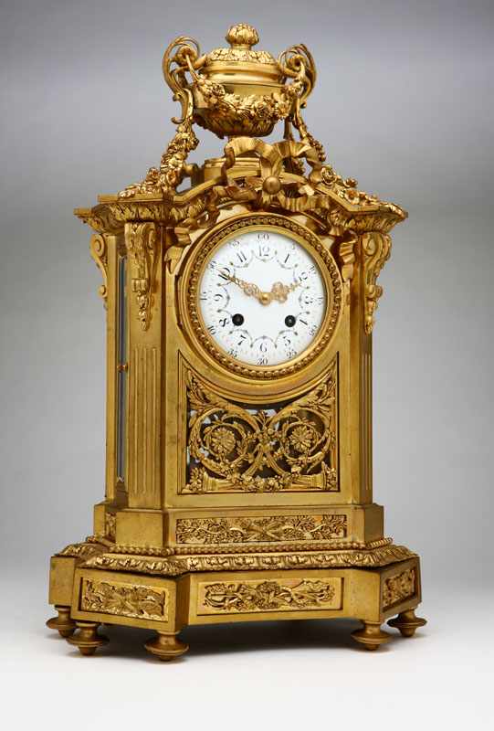 Appraisal: A Louis XVI style gilt bronze double-sided mantel clock Late