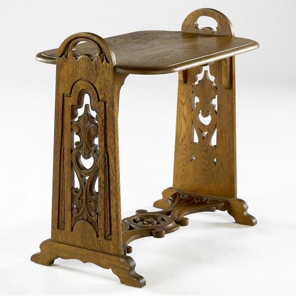 Appraisal: LIFETIME Carved side table with cut-out decoration and handles Paper