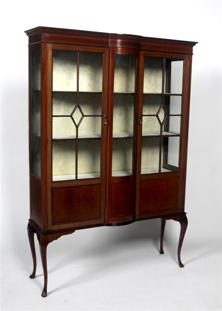 Appraisal: An Edwardian mahogany and inlaid display cabinet the projected moulded