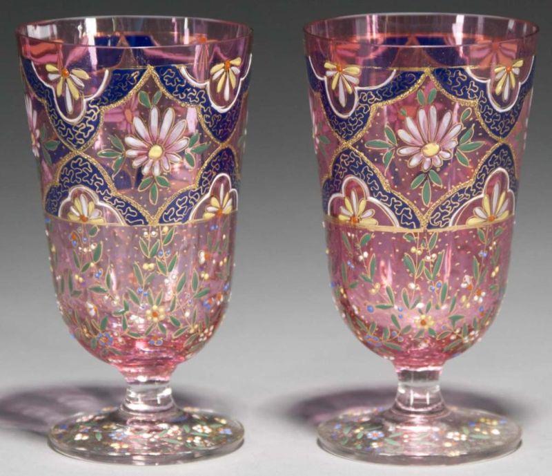 Appraisal: Pair of Moser Cranberry Footed Tumblers Description Circa Condition Excellent