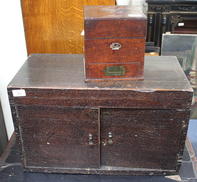 Appraisal: AN OLD OAK BOX with carrying handles to the side