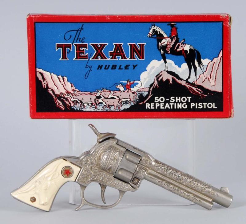 Appraisal: Cast Iron Texan Hubley Cap Gun Description Hammer has some