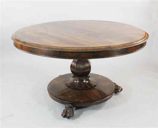 Appraisal: A Victorian rosewood breakfast table with circular top and understage