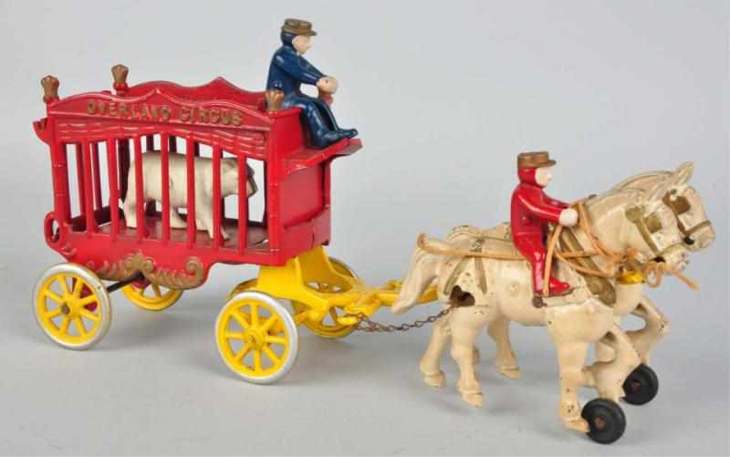 Appraisal: Cast Iron Kenton Overland Circus Horse-Drawn Toy American Includes original