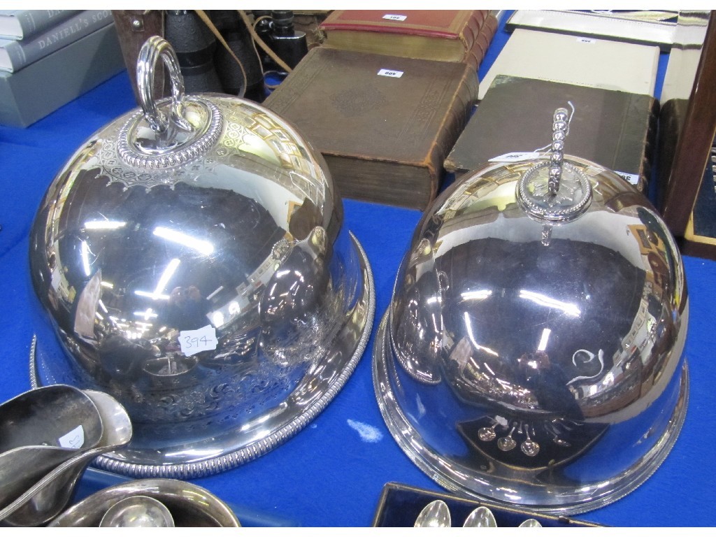 Appraisal: Lot comprising two silver plate meat dish covers