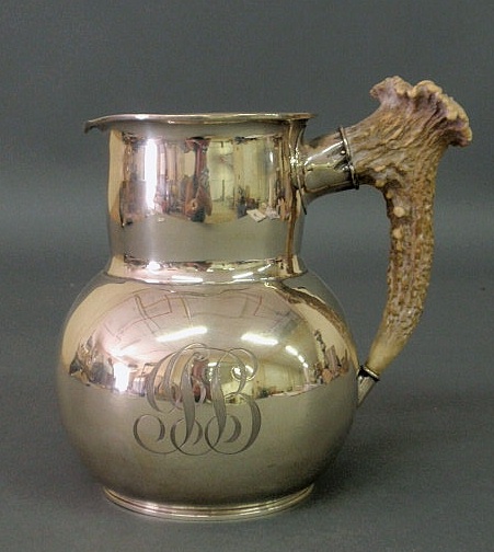 Appraisal: Sterling silver pitcher with a stag horn handle monogrammed and