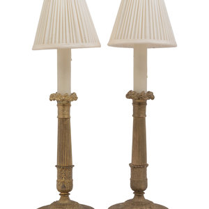 Appraisal: A Pair of Charles X Style Gilt Metal Candlesticks Mounted