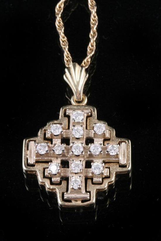 Appraisal: K YELLOW GOLD AND DIAMOND JERUSALEM CROSS PENDANT ON CHAIN