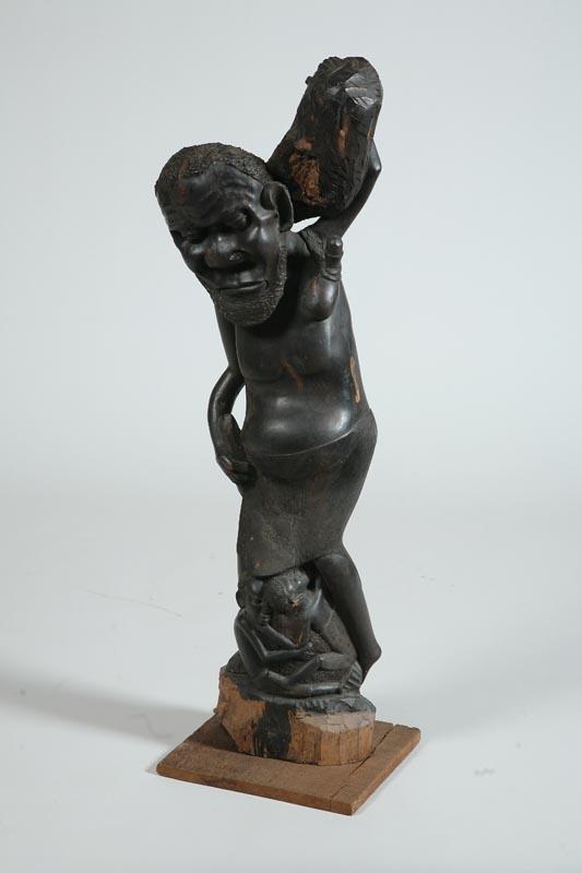 Appraisal: FIGURAL CARVING African mid th century hardwood Makonde statue of