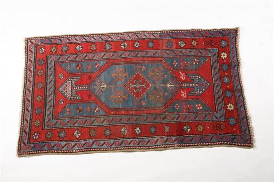 Appraisal: ORIENTAL RUG Serab Geometric design in reds and blues '