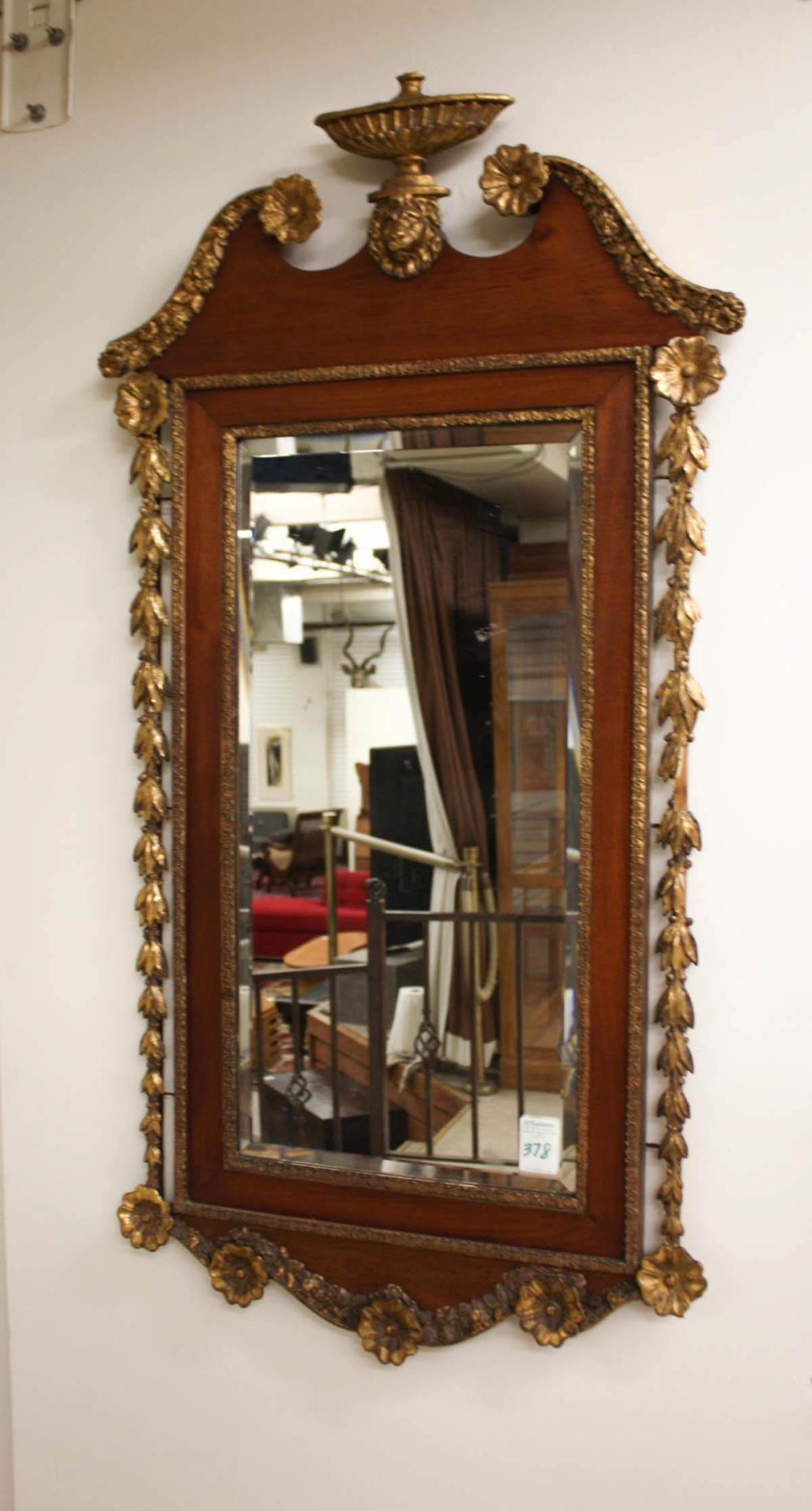 Appraisal: CHIPPENDALE STYLE MAHOGANY AND GILT GESSO WALL MIRROR a classic