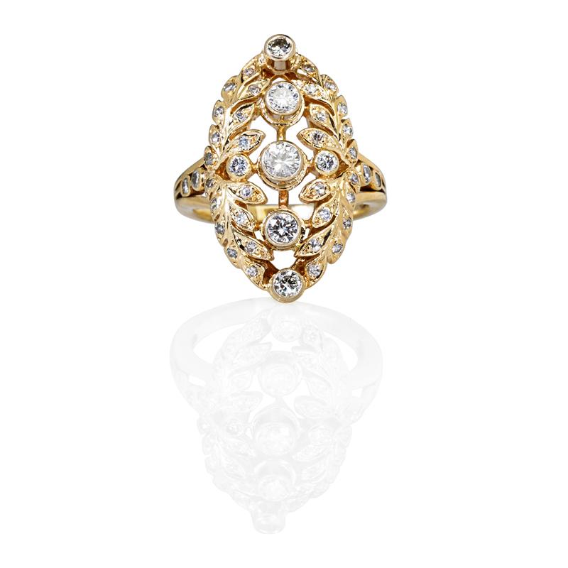 Appraisal: K YELLOW GOLD DIAMOND FOLIATE NAVETTE RING RBC diamonds laterally